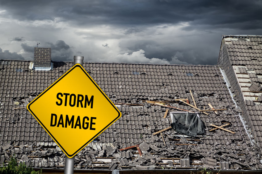 roof with storm damage in need of roof repairs